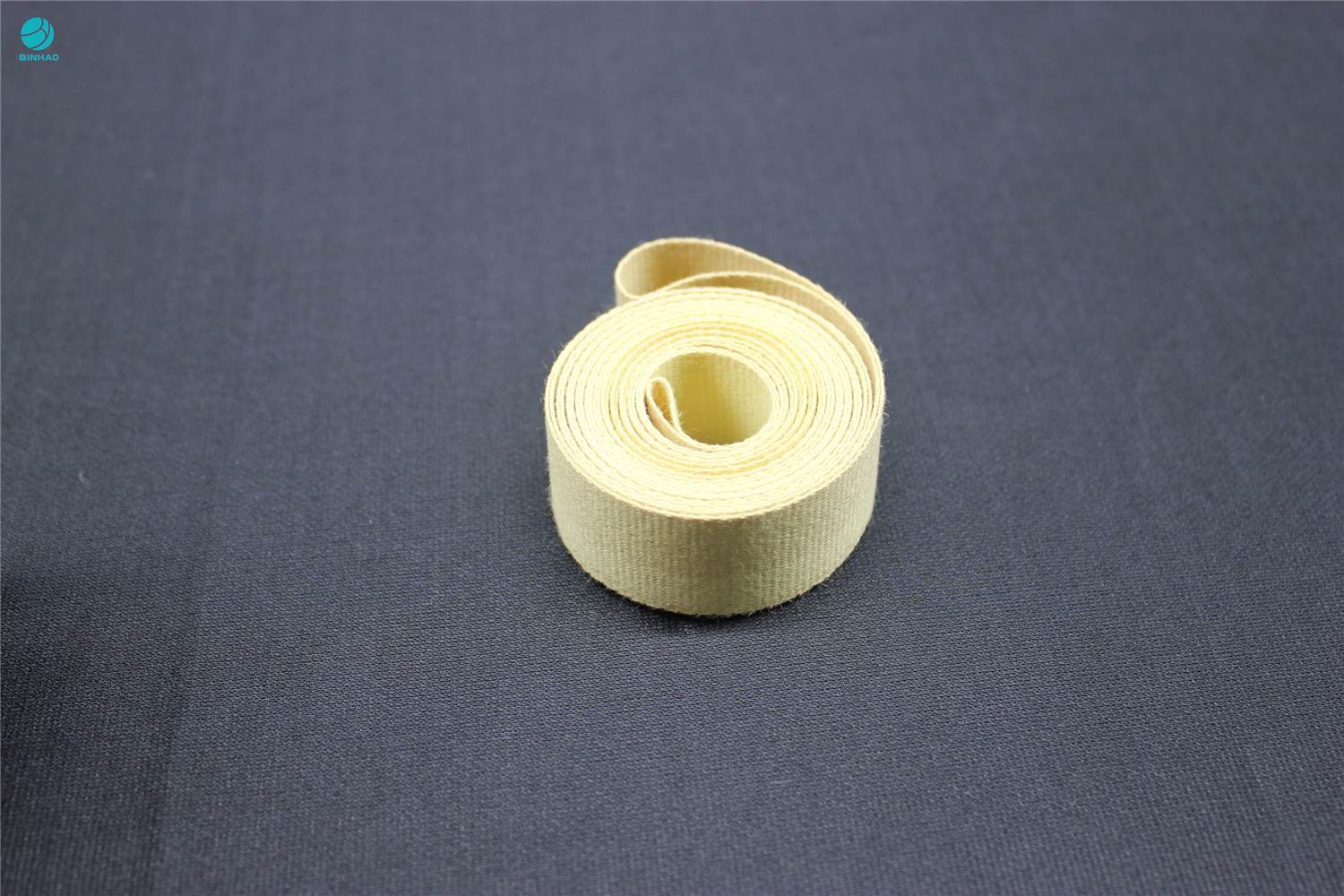 0.5mmの厚さの明るく黄色いケブラー繊維のタバコ機械のための耐久の無限の吸引テープ